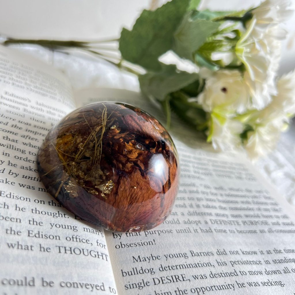 Red rose preservation in resin paperweight