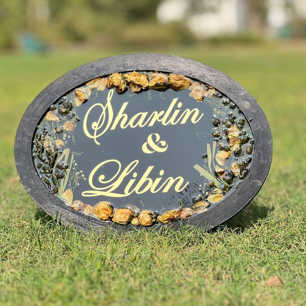 Oval resin nameplate with varmala preservation and couple’s names